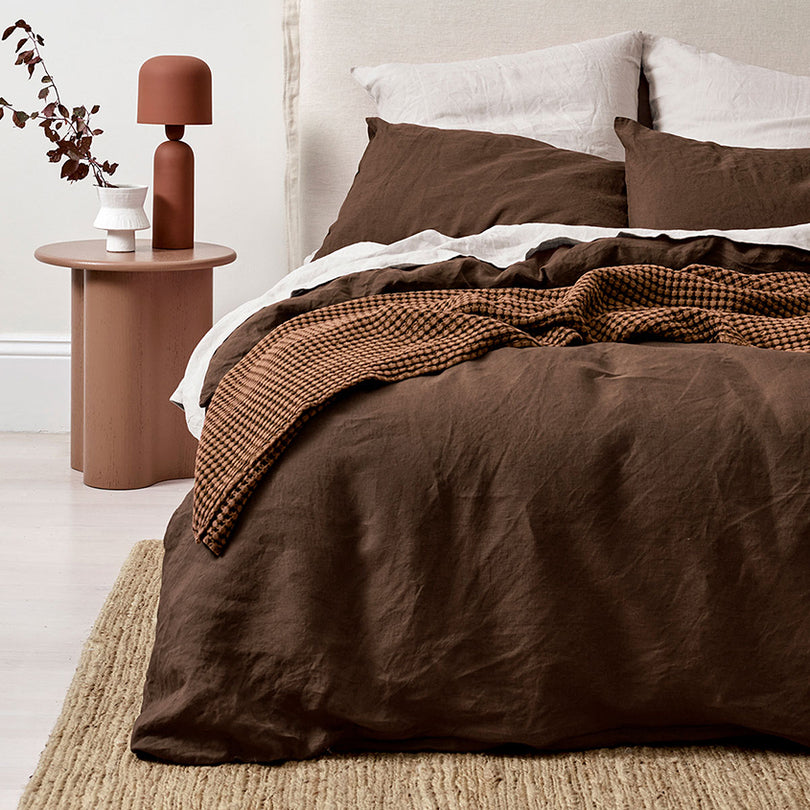 Emile by Aura linen bedding collection styled on a bed in new AW26 colours