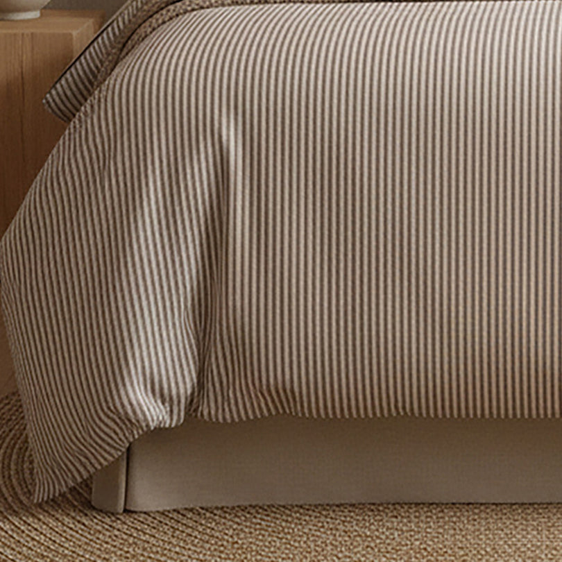 Queen bed styled with a Queen size quilt